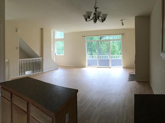 View of downstairs living space from kitchen