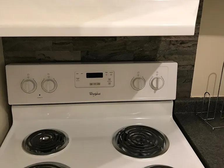 stove and hood in kitchen