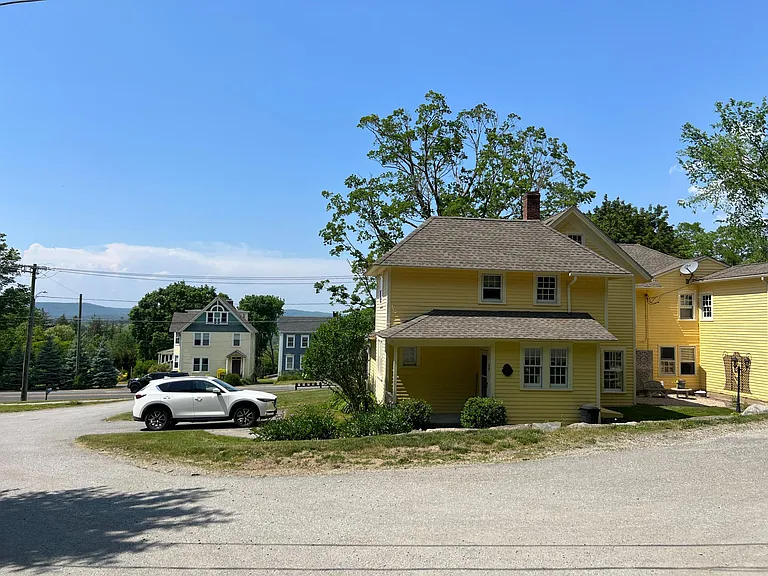 Neighboring building and view from top of driveway