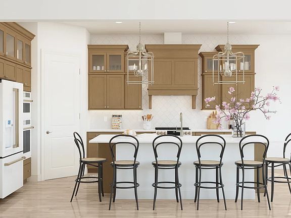 Kitchen with glass upper cabinets and pendant lighting