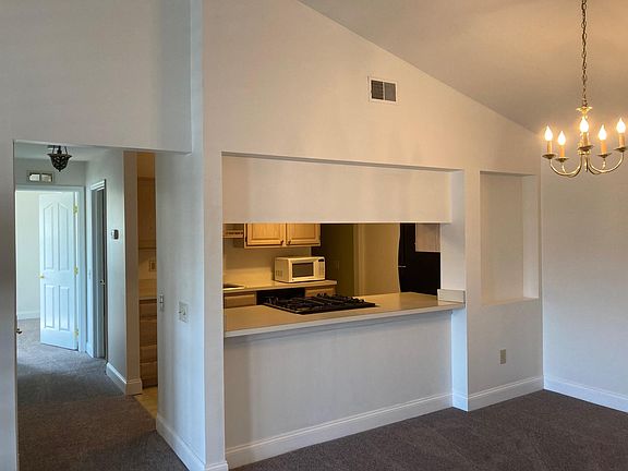 Kitchen and Hallway leading to Bedrooms. Taken from Great Room