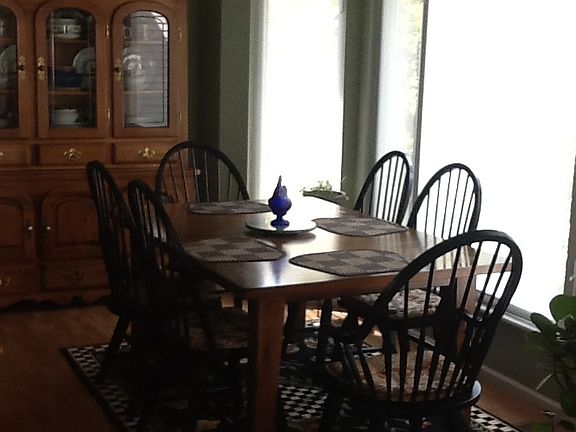 Breakfast Room with view  with Champion picture window to beautifucommon groun