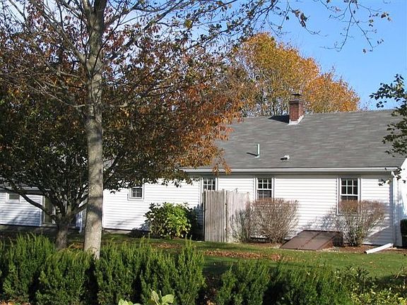 Rear - large back yard with outdoor shower