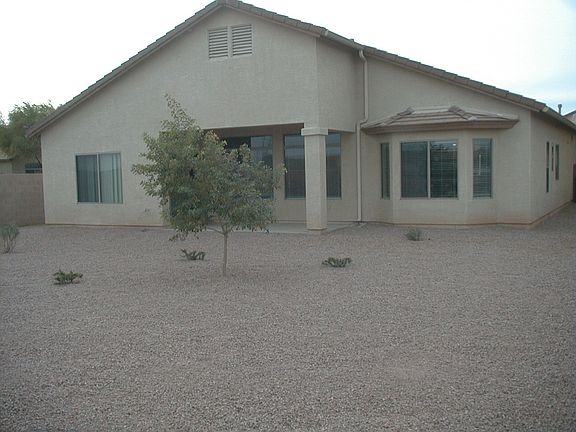 Recently landscaped back yard with automatic watering system