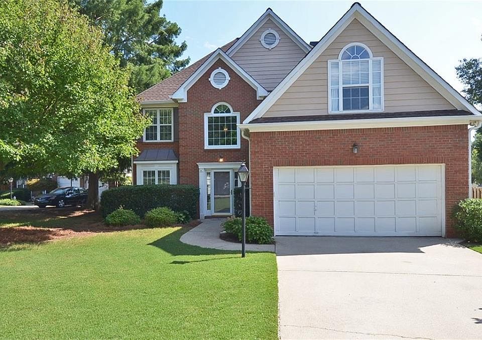 Large inviting front yard. Corner lot at end of the cul-de-sac.