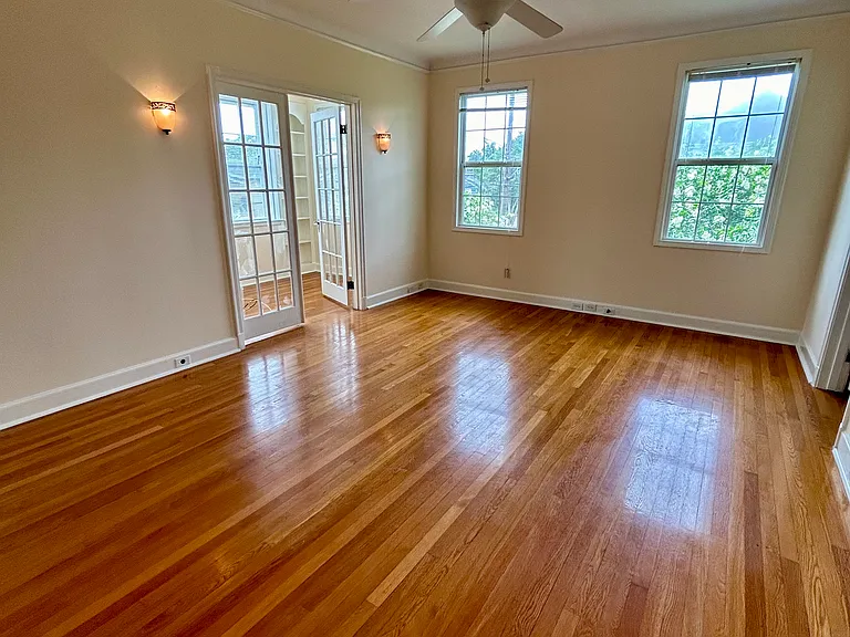 living room with view of the office through the French doors