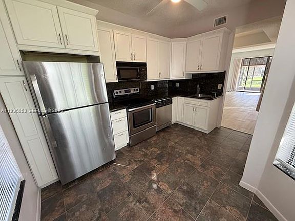 3rd image of 7860 Lexington Club Blvd APT B