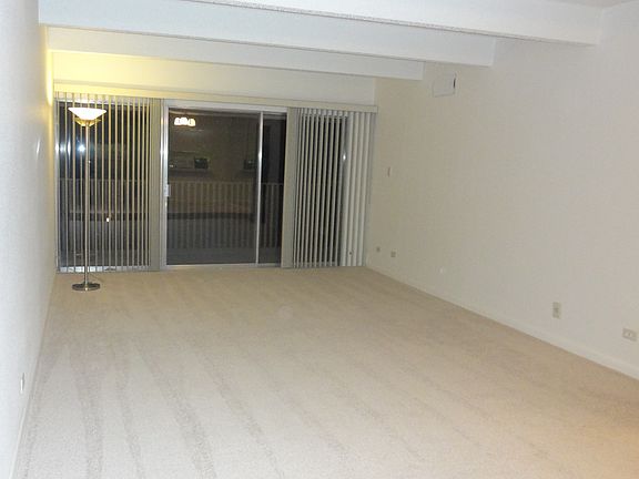 Living room opens to balcony