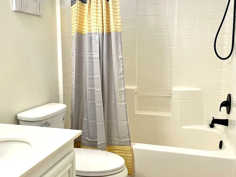 Shared bathroom with Tub and shower