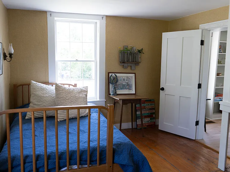 Downstairs bedroom with full bed
