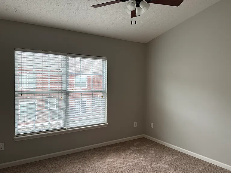The second of three bedrooms upstairs.