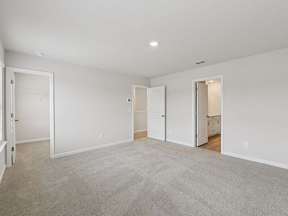 Primary bedroom in the Lewiston floorplan at a Meritage Homes community in Atlanta, GA.