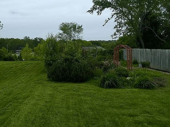 back yard with flower garden