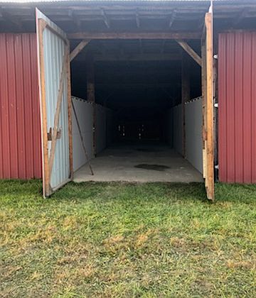 Outside of unit. Large 13.5' wide double doors.