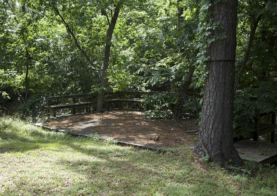 Rustic area with small creek bed.
