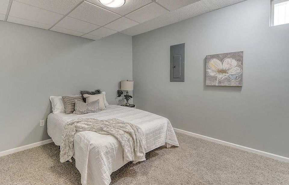Picture of room with bed. Apartment is unfurnished, so this is only representative. Picture taken in mid-day light.