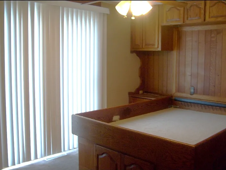 Main bedroom with built-ins for queen size bed with lots of storage.