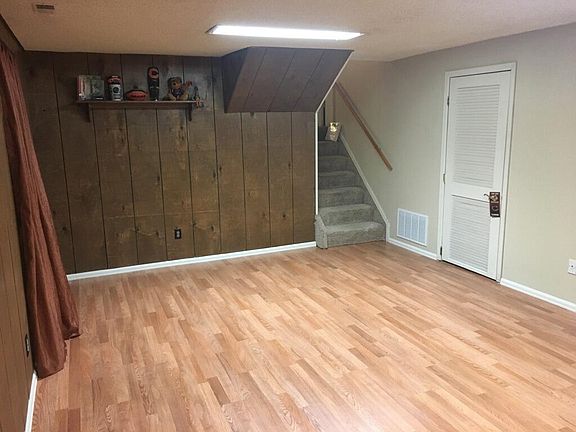 Basement New hardwood floor and fresh paint. Newer hot water heater and furnace