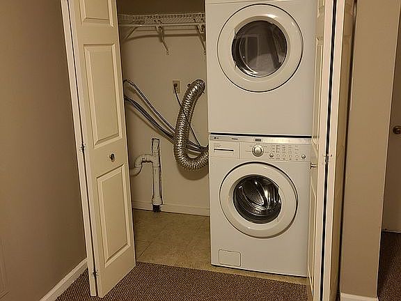 Laundry with storage closet