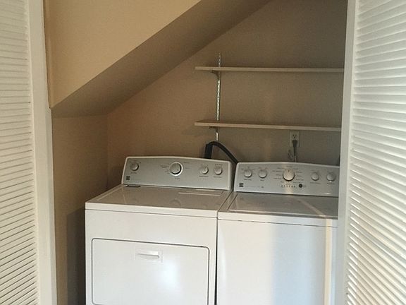 WASHER AND DRYER NEXT TO DINNING