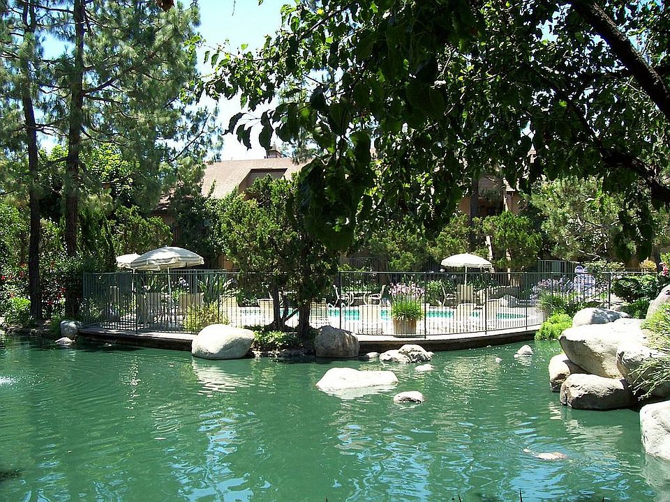 Tranquil lake and swimming pool