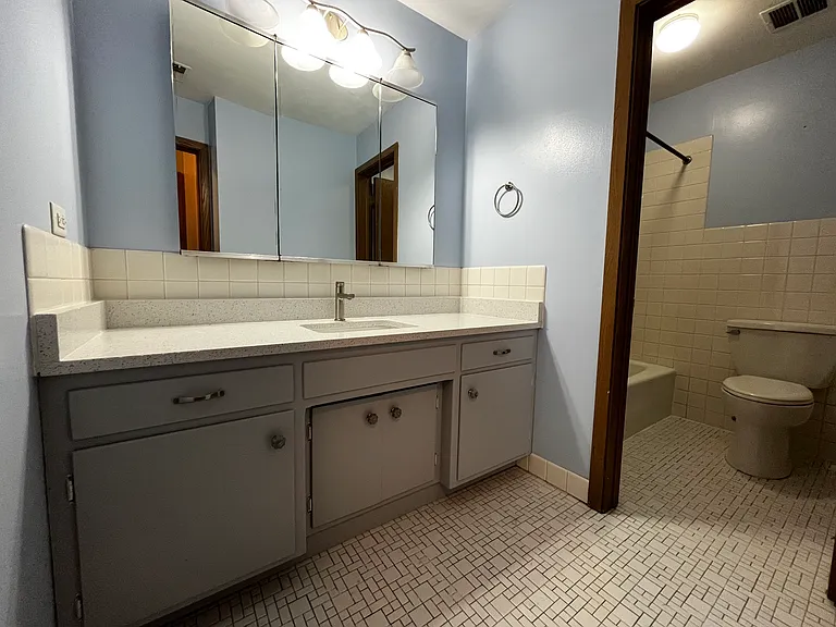 Storage behind mirrors