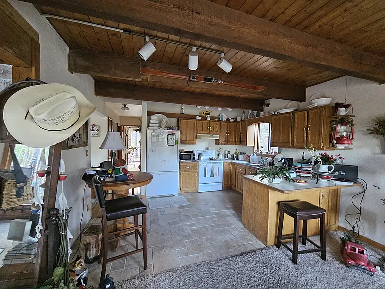 Main kitchen on 2nd floor. Refrigerator and micro wave on 3rd floor for your convenience. Everything you need to play house on your days off.