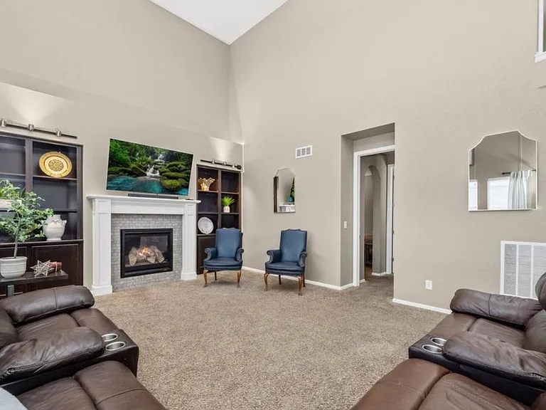 Living room. Single bedroom suite with closet and private bathroom with closet are through the doorway. There is a door to create total privacy