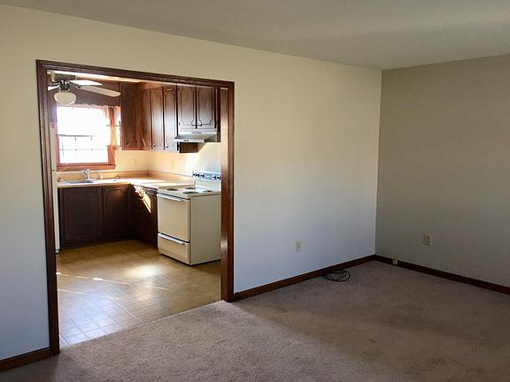 Living room off of kitchen; Interior freshly painted