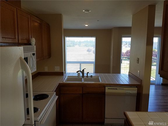 4th image of 9735 272nd Pl NW APT 523