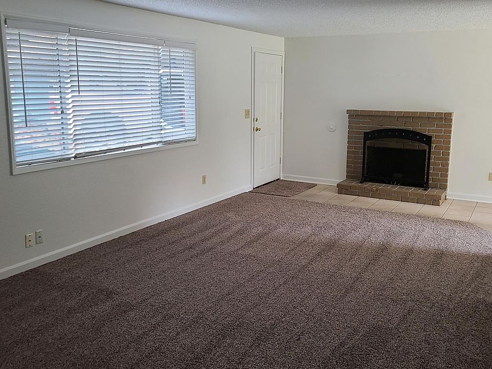Living Room with wood burning fireplace