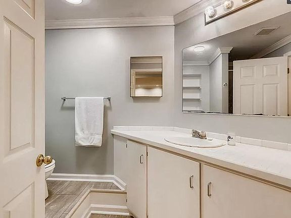 Basement studio suite bathroom with shower.