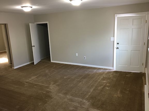 Living Room w/ bonus storage closet
