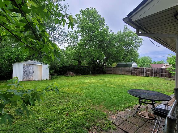 Large back yard with shed