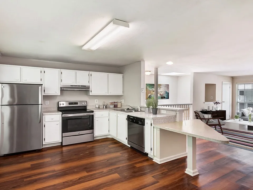 Open concept layouts with large kitchens and living rooms
