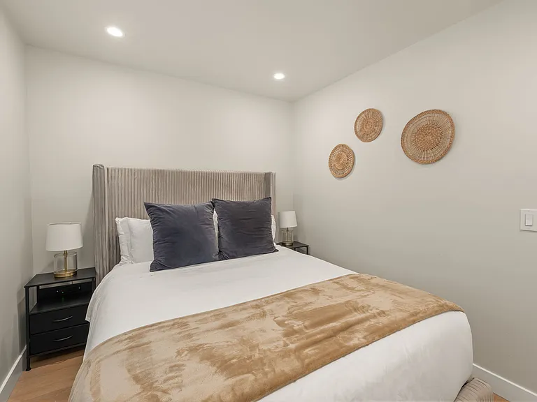 A cozy queen bed that can sleep up to 2 people for a restful night of sleep.