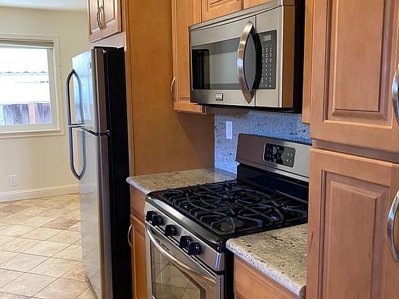 Kitchen from front hall entrance 1