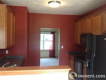 Fully furnished kitchen with matching appliances.