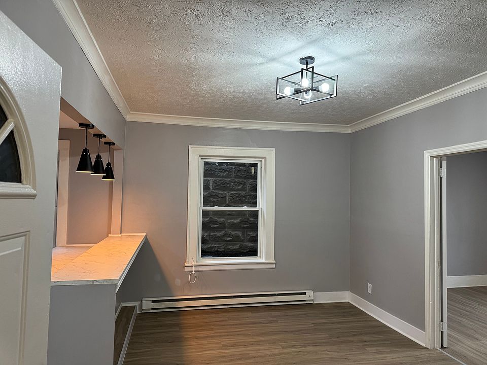 Main entry leads into open living space with contemporary finishes.