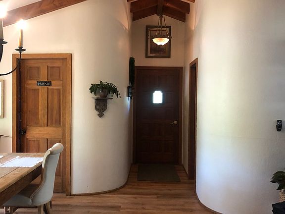 Unique entry into dining area. Everyones favorite room. To the left is the walk in pantry and to the left of the front door is a full bathroom.
Ceiling fan