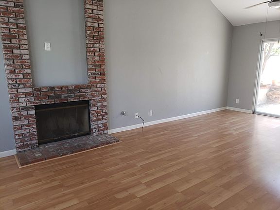 Living room wood burning fireplace