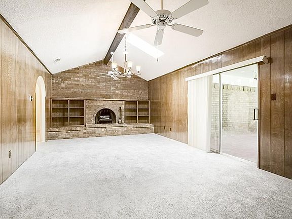 The fireplace and doorways in this living area will define your personal decorating ideas. There are so many options.