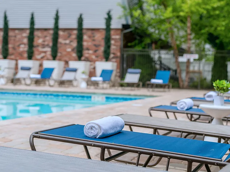 Your ultimate poolside escape includes sun-soaked loungers and a sparkling swimming pool for vacation-like relaxation.