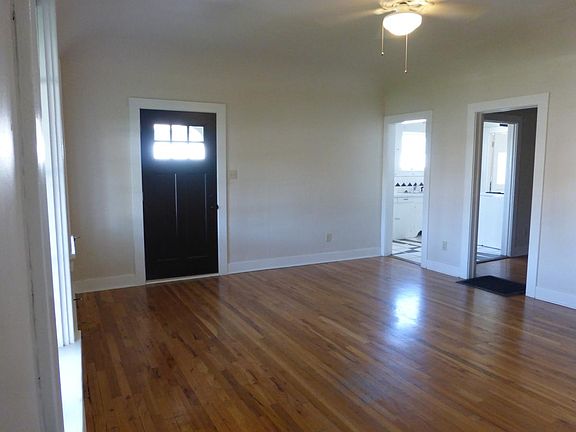 Living room facing kitchen and office