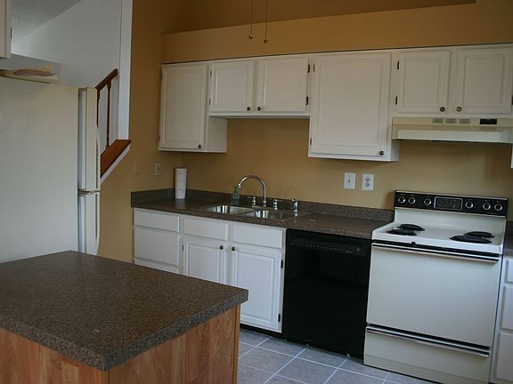 Kitchen w/new counters & vaulted ceiling