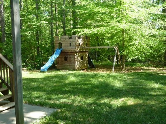 2 slides/ swing in your back yard