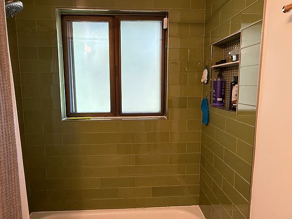main floor bathroom shower/bath tub