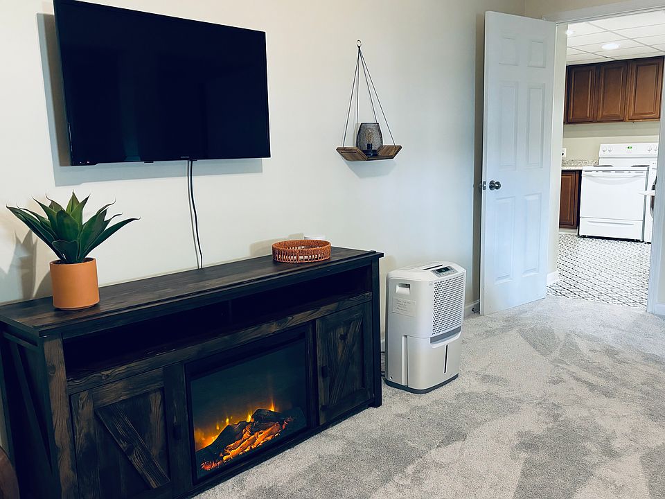 Electric fireplace and television included