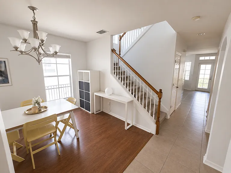 This floor is a true shotgun floor. The front door and back door are directly in line with each other.