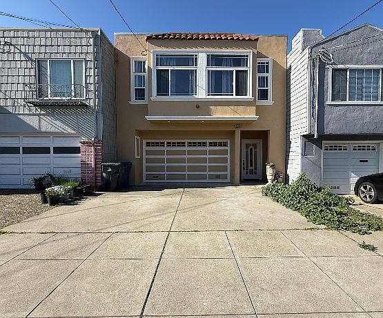 2 car garage with 2 spaces on driveway